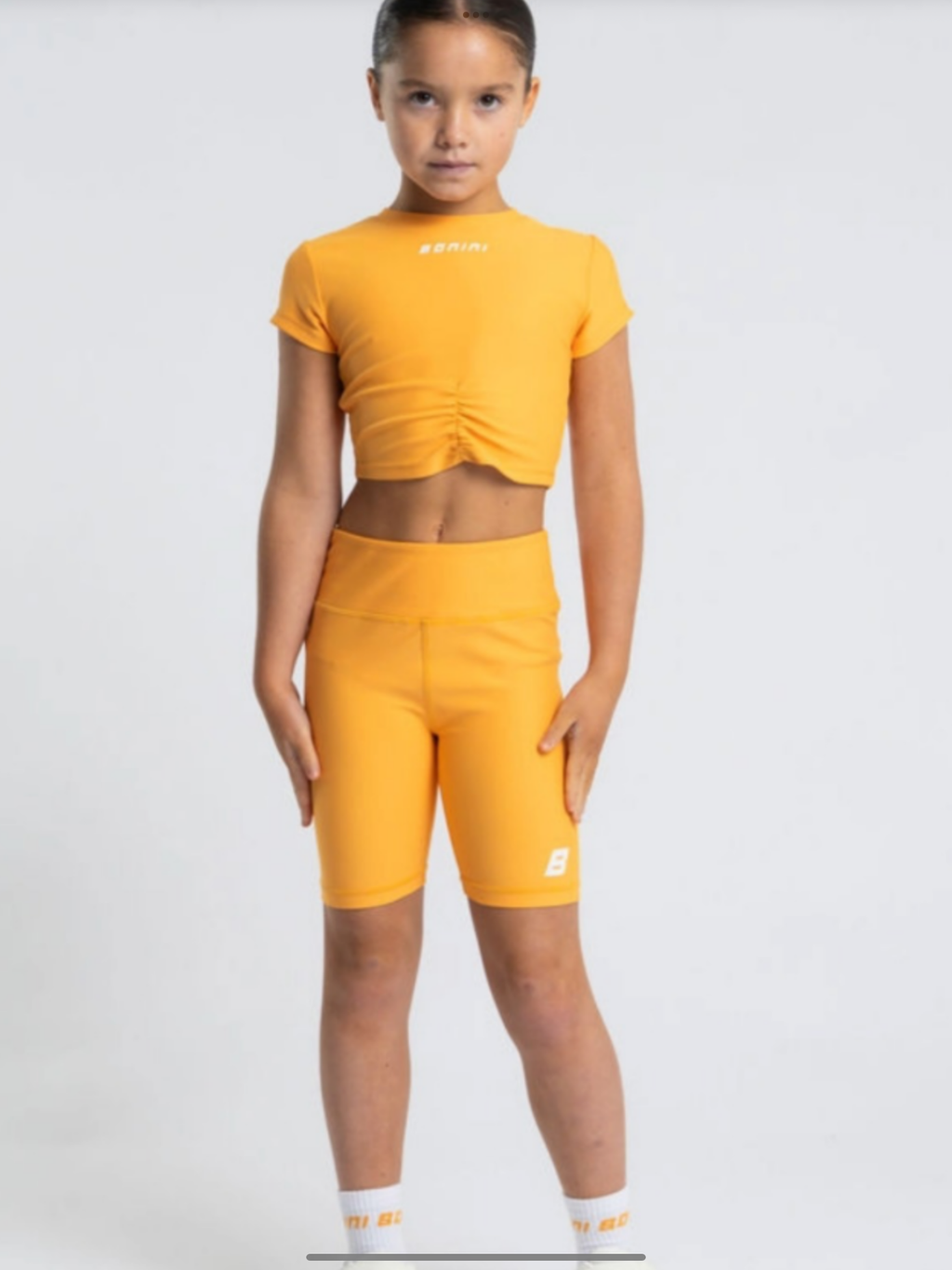Bonini by A* Dee Aspire Short Sleeve Ruched Top - Florida Orange  0226621