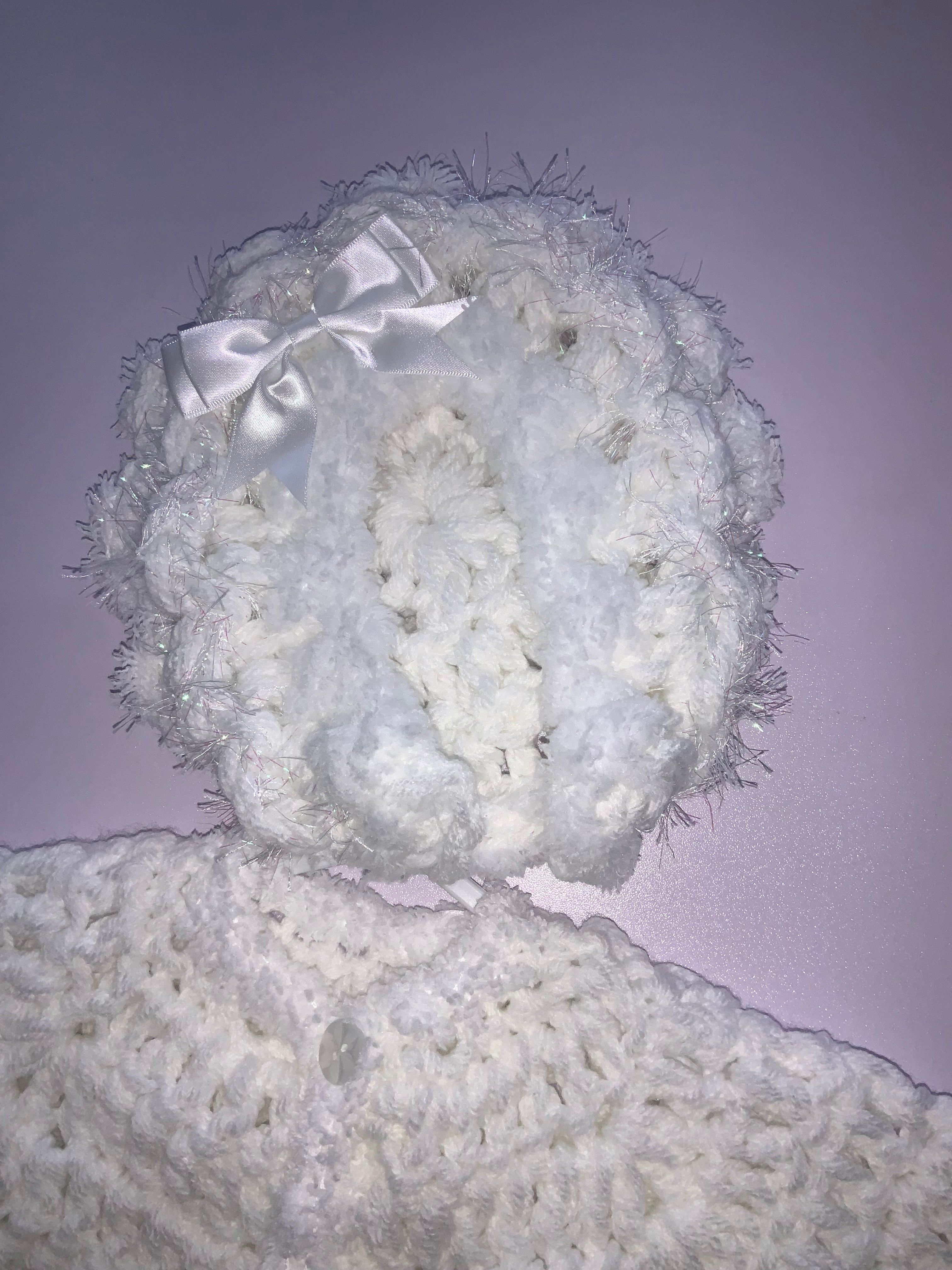 Crocheted cardigan and bonnet 06242344