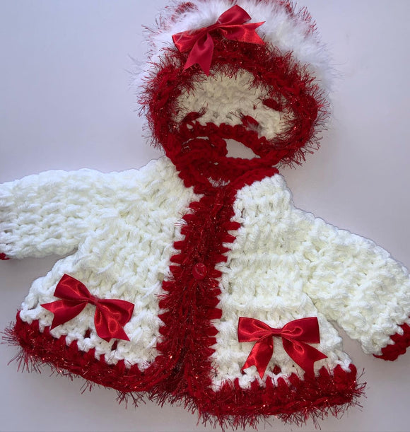 Crocheted cardigan and hat.     10221231