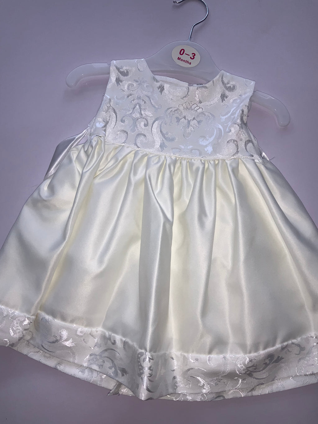 Ivory occasion dress.  02231416
