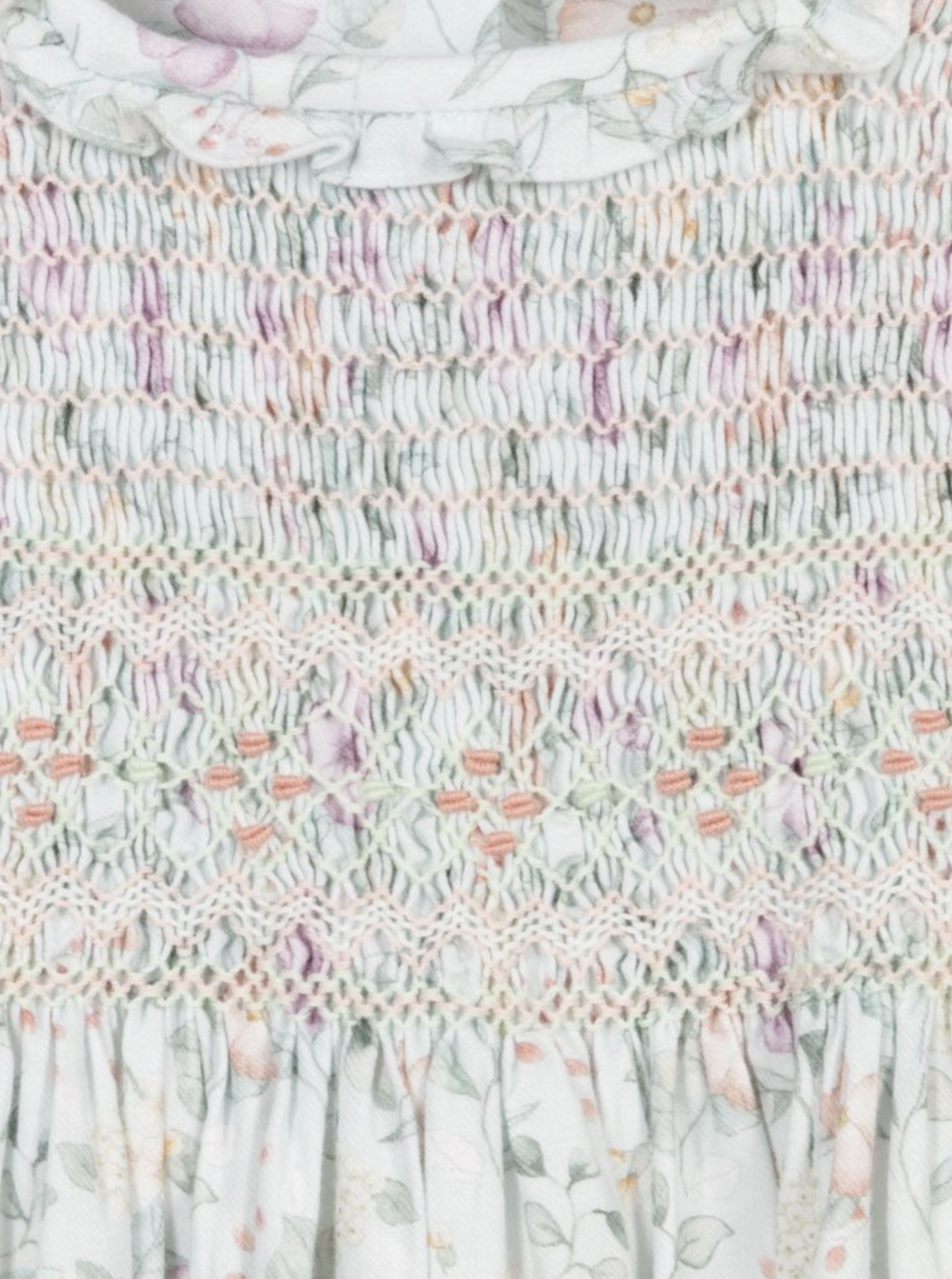 Sarah-louise Hand smocked dress.         0921621